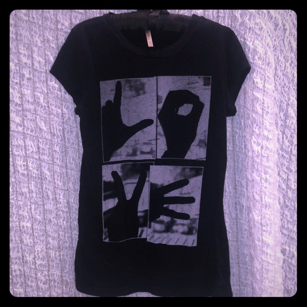 Black tshirt LOVE in ASL sign.